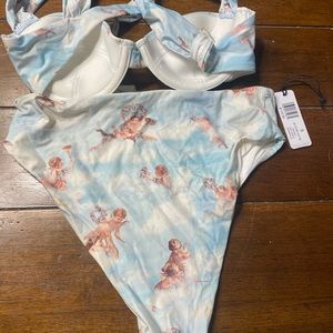 Weworewhat swimmie - got tanner but it blends in when on the top (has tags)